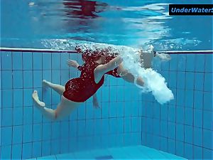 two hot teenagers underwater