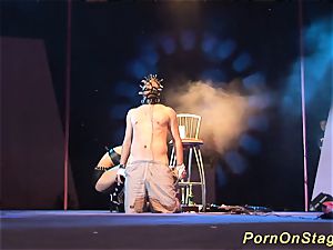 ultra-kinky fetish needle demonstrate on stage